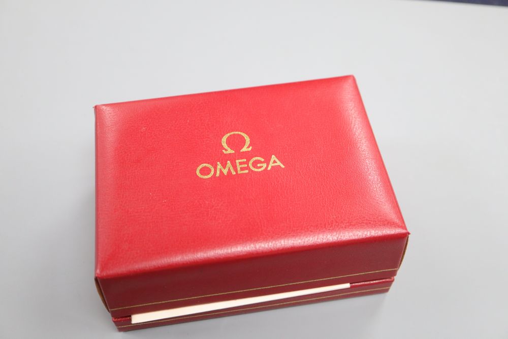 A gentlemans 1980s steel and gold plated Omega De Ville manual wind wrist watch, on associated strap, with box.